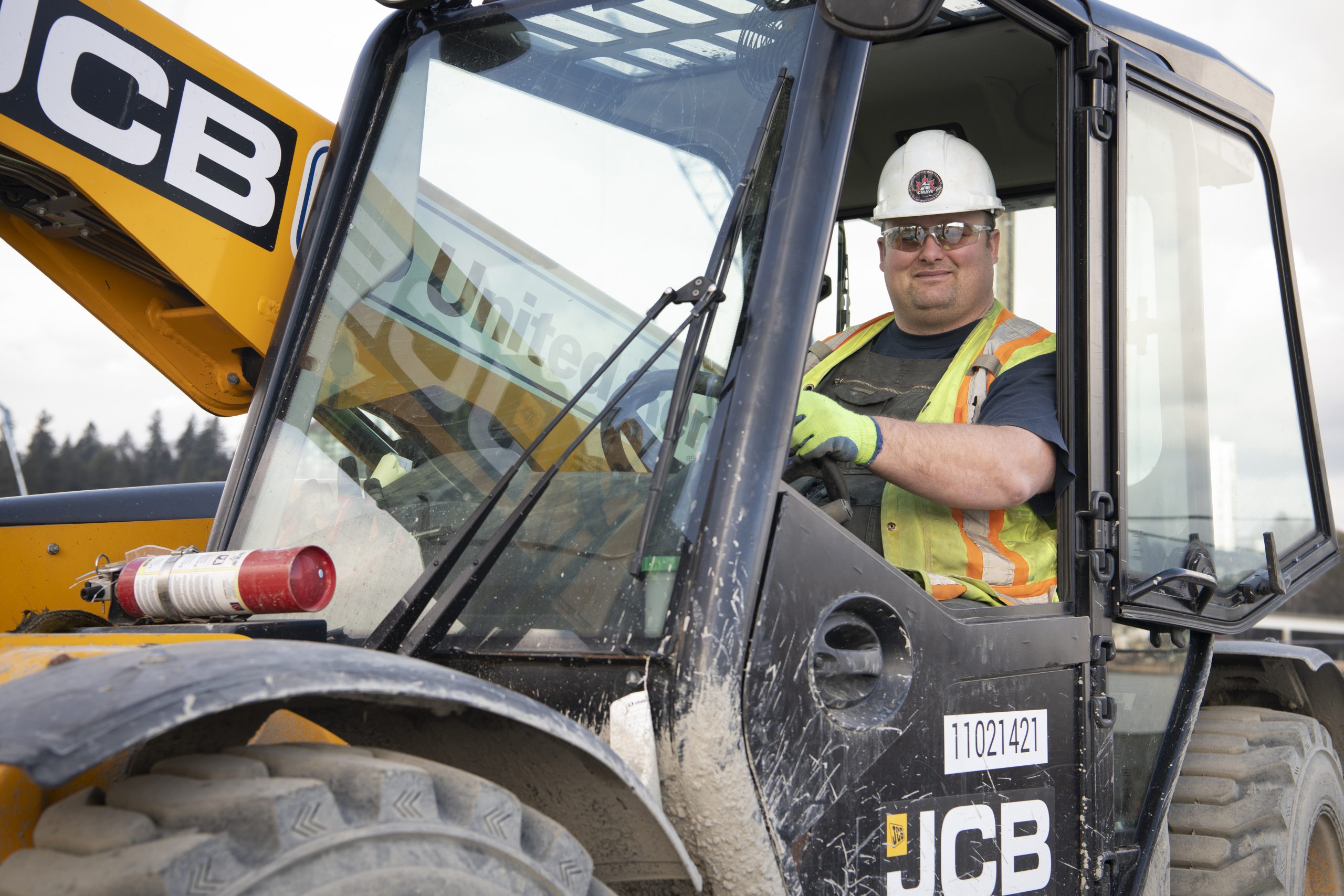 A picture of a BCIB employee named Byron driving a truck