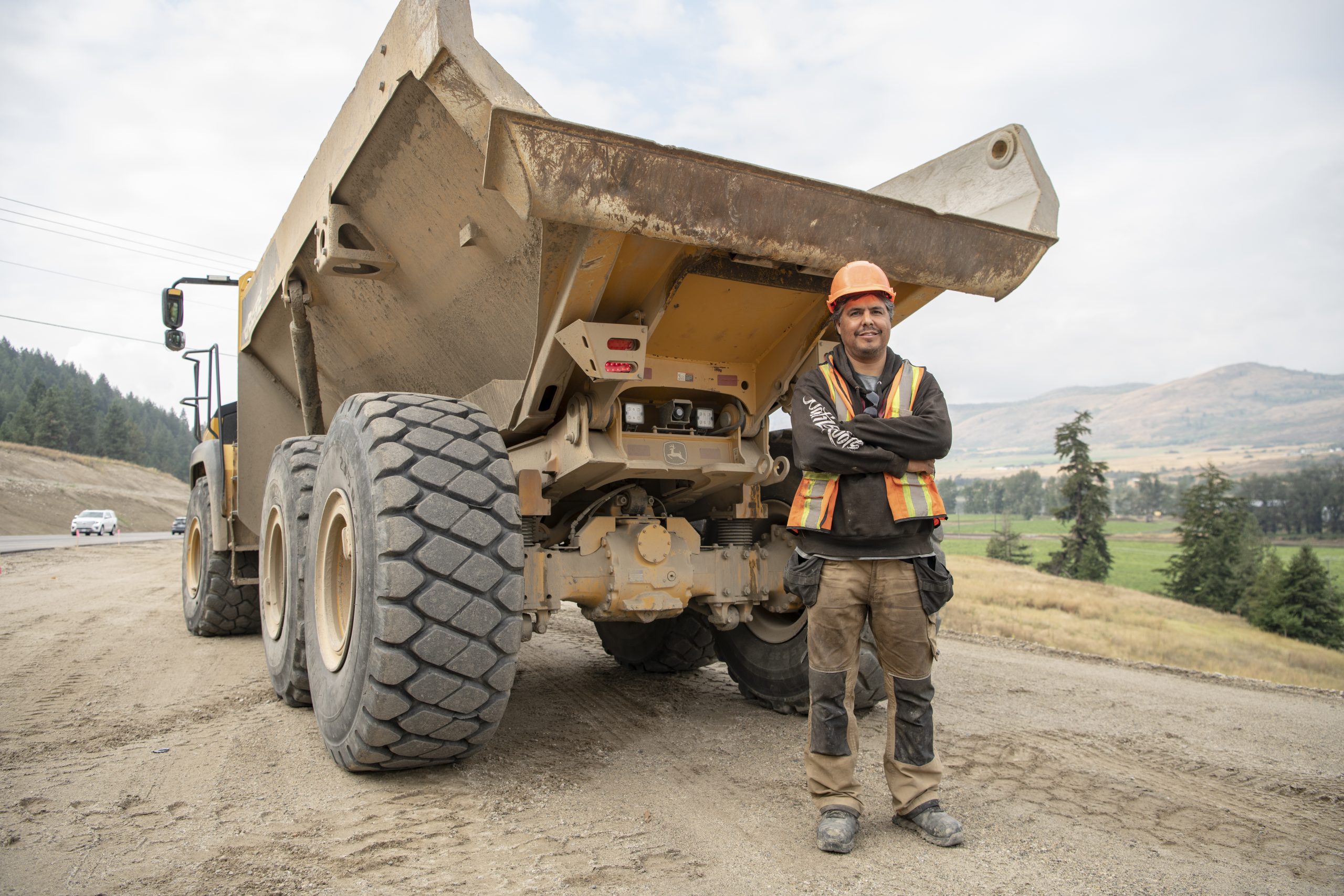 Picture of Andy standing next to a truck