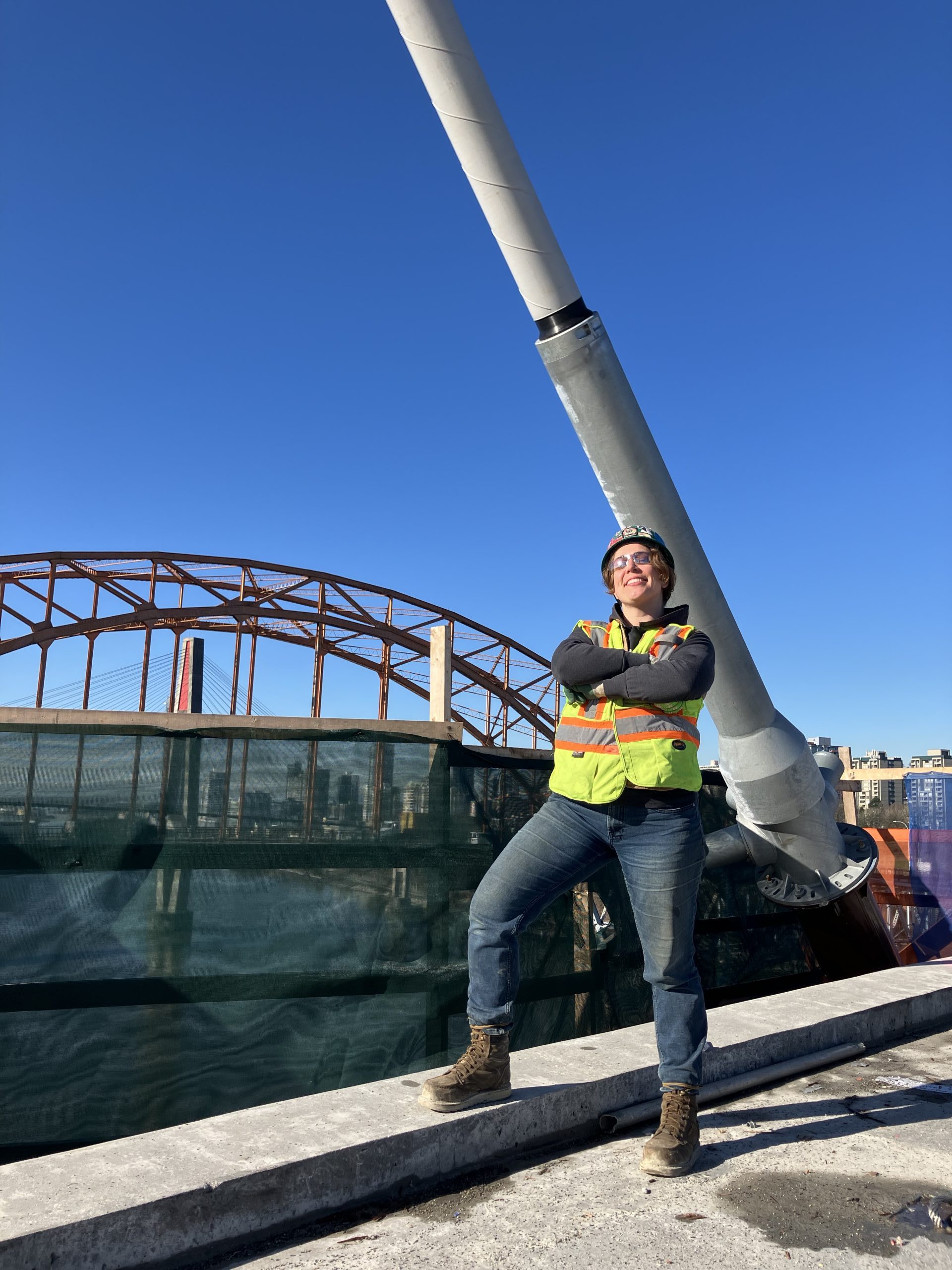 Carla standing on site at the Pattullo Bridge project location.