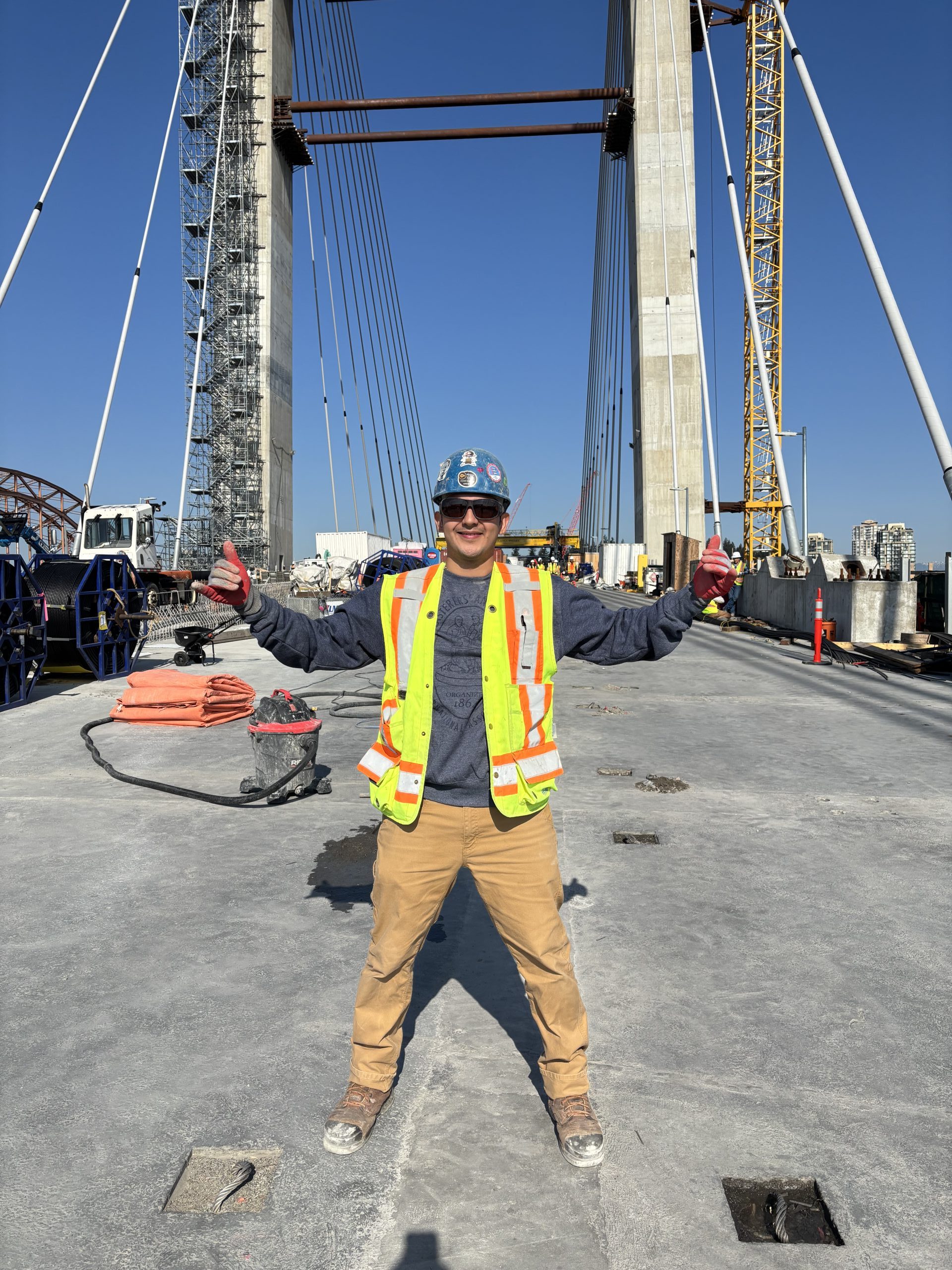 An apprentice posing on the Pattullo Bridge.